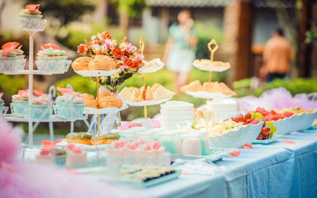 a table with a bunch of food that is catered